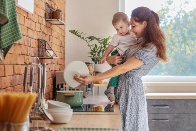Happy family in their beautifully remodeled kitchen by Unique Precision Remodeling LLC