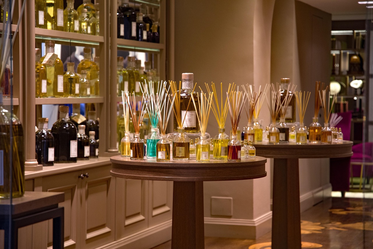 Elegant upscale fragrance boutique with custom millwork, sophisticated lighting, and premium product displays in Charlottesville, Virginia